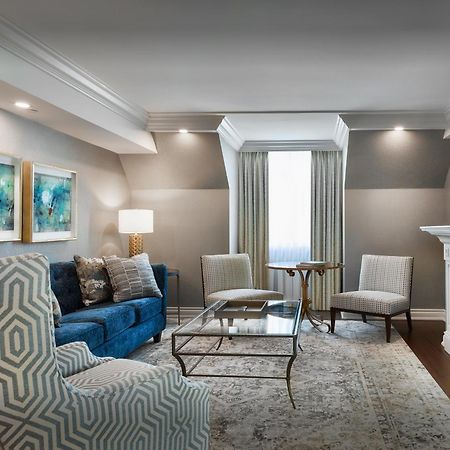 Chateau Vaudreuil Exterior photo A living room at the hotel