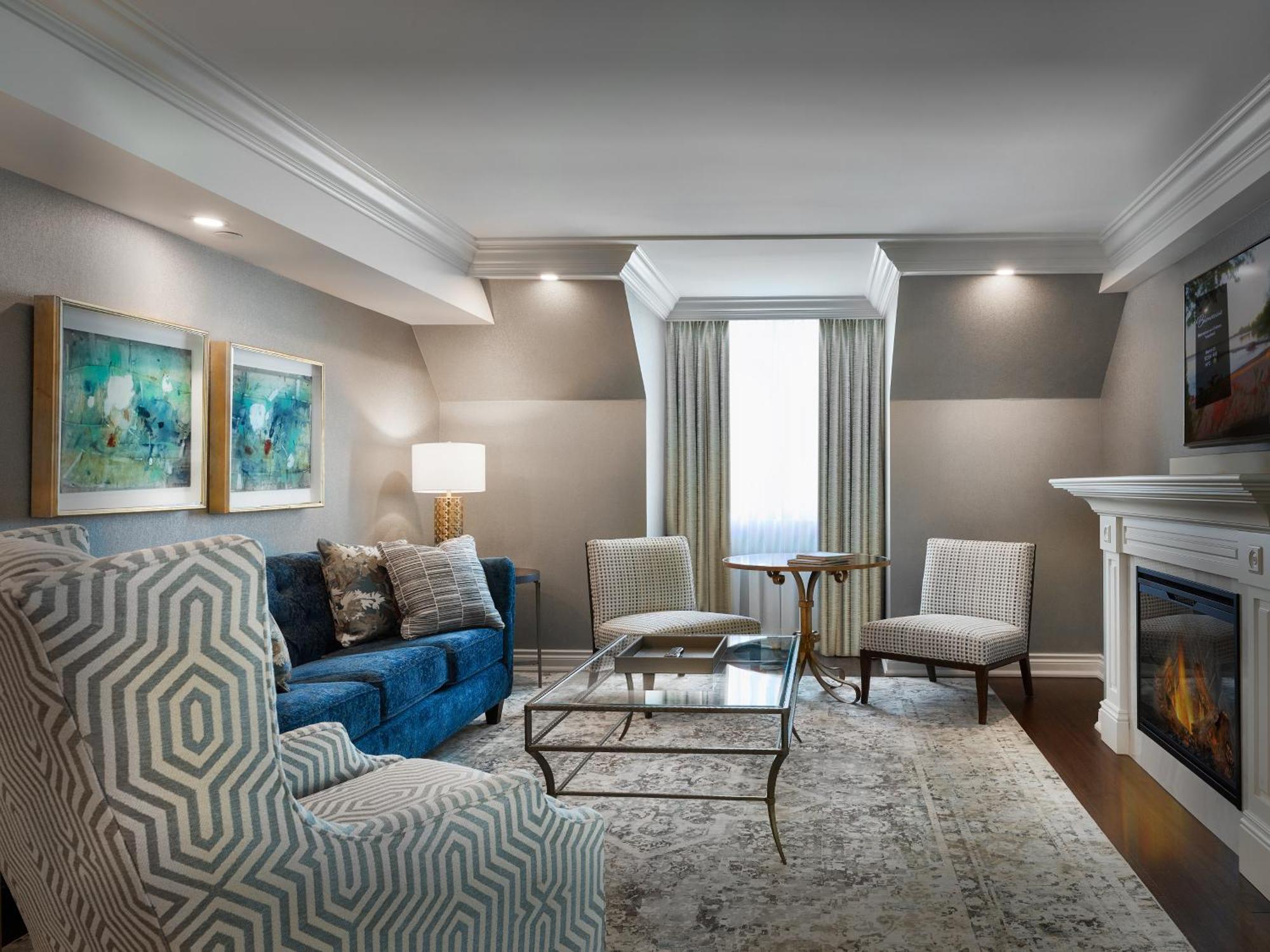 Chateau Vaudreuil Exterior photo A living room at the hotel