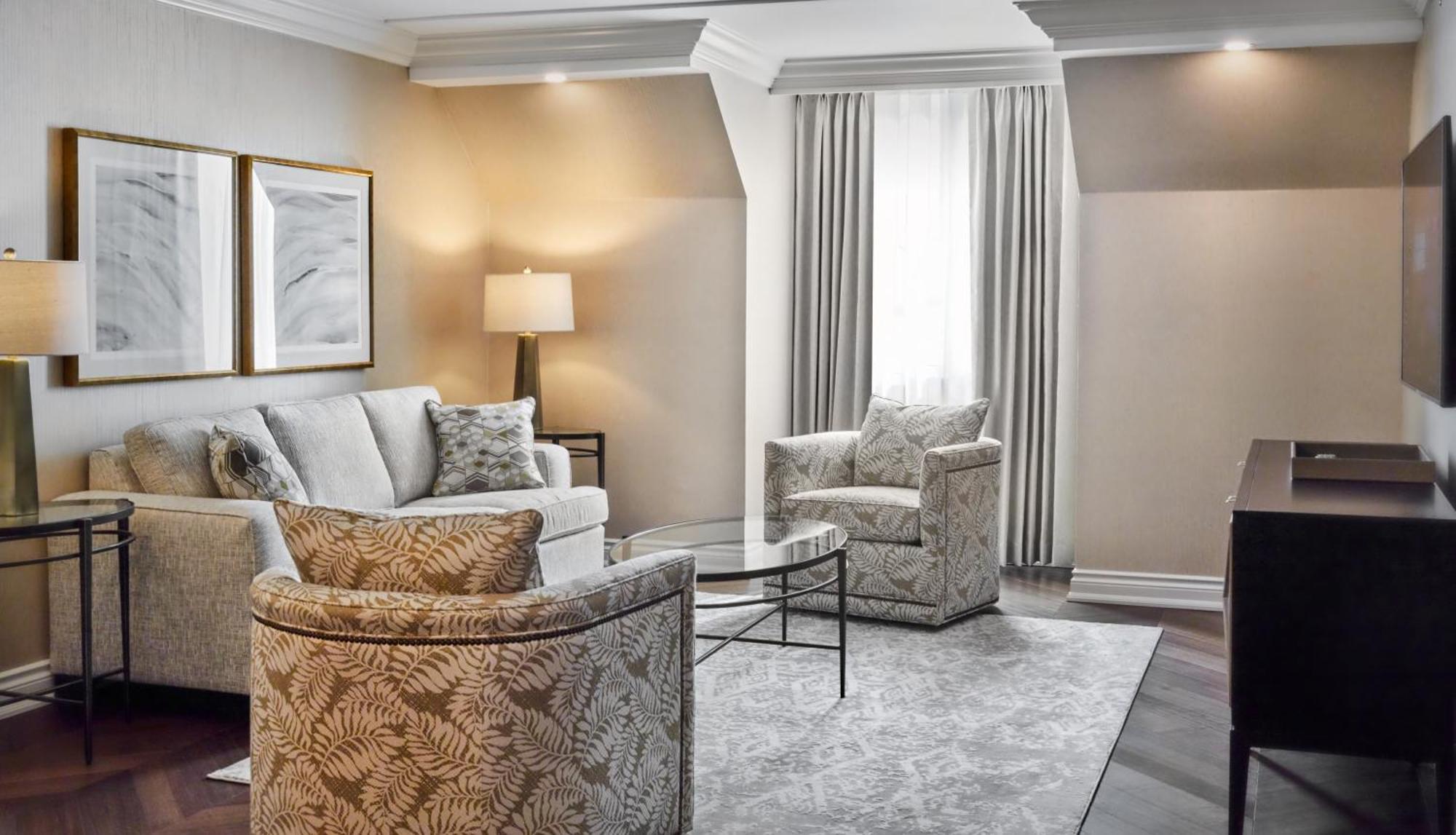 Chateau Vaudreuil Exterior photo A living room at the Ritz-Carlton, Boston